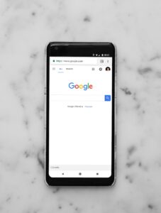 on page seo checklist - black Android smartphone showing google site on white surface